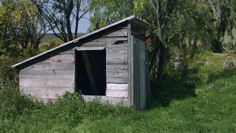 Slow Motion Abondoned Shed in Lush Rural America Stock Footage