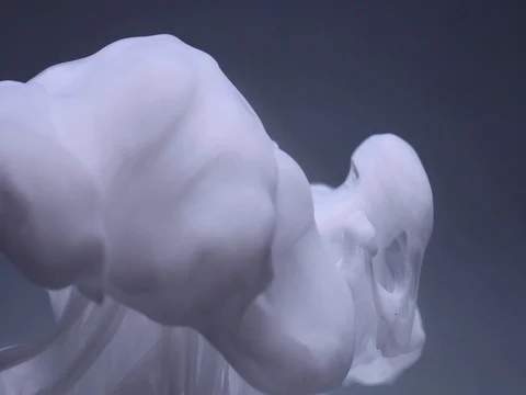 Slow motion abstract flowing shot of paint in water Stock Footage 80594239