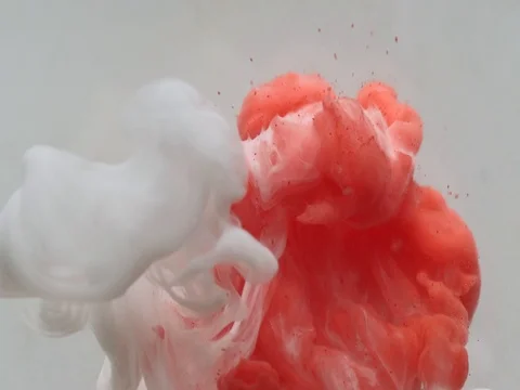 Slow motion abstract shot of flowing paint in water Stock Footage