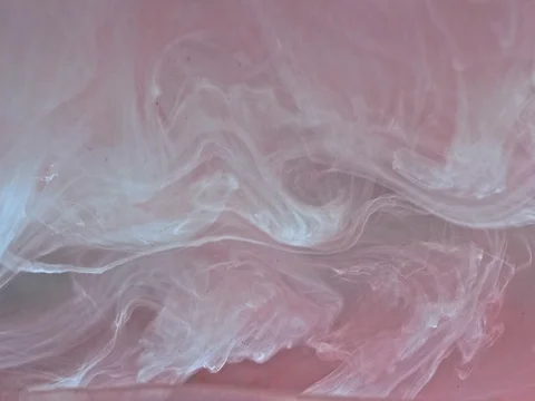 Slow motion abstract shot of flowing paint in water Stock Footage