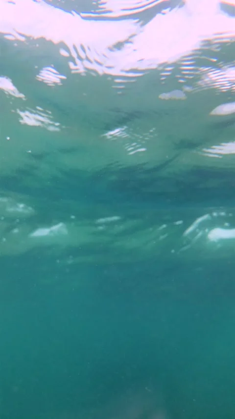 Slow Motion Abstract Surface Of Turquoise Tropical Water With Sun Refraction Stock Footage 329627537