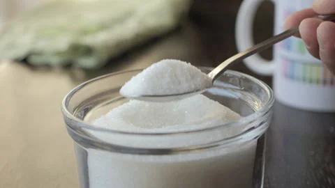 Slow Motion Act of Scooping Pure White Sugar With Spoon. Taking Teaspoon of.. Stock Footage 321425533