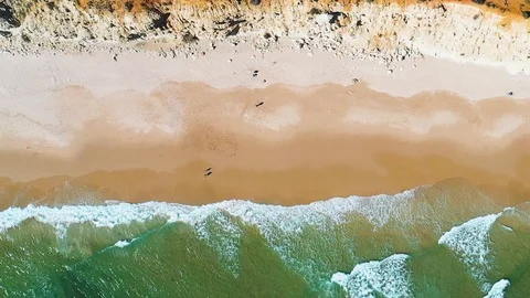 Slow Motion Aerial Drone View Of Atlantic Ocean Waves Crashing Over A beach Video stock 109415683