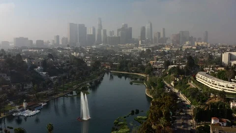 Slow Motion Aerial of Echo Lake and Downtown LA on Sunny Day with View of City Stock Footage 115737720