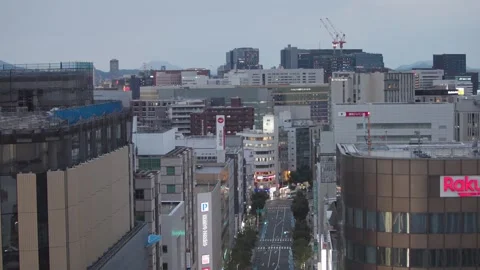 Slow motion aerial night view of Fukuoka skyline with city lights Stock Footage 342811285