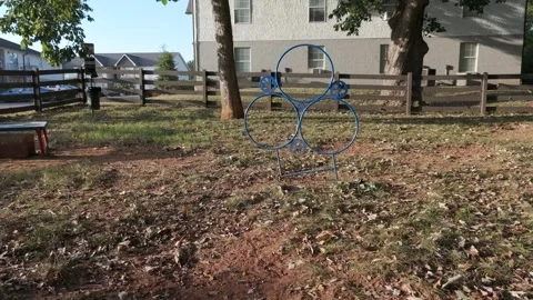 Slow motion aerial pan across dog park with apartment buildings Stock Footage 346732767