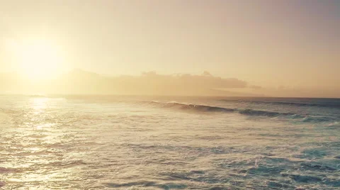 Slow Motion Aerial Sunset View of Big Ocean Waves Breaking Stock Footage 56451382