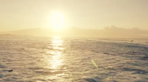 Slow Motion Aerial Sunset View of Big Ocean Waves Breaking Stock Footage 56452003