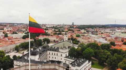 Slow motion aerial view old castle tower in Old Town and Vilnius city panoram Stock Footage 157890704