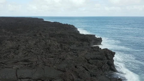 Slow Motion Aerial Of Waves Colliding With Fresh Lava Rock From 2018 Flow Stock Footage 118701271