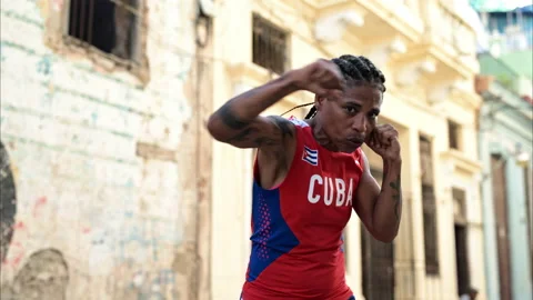 Slow motion of an afro Caribbean women sparring in the streets of Havana Cuba. Stock Footage 236003853