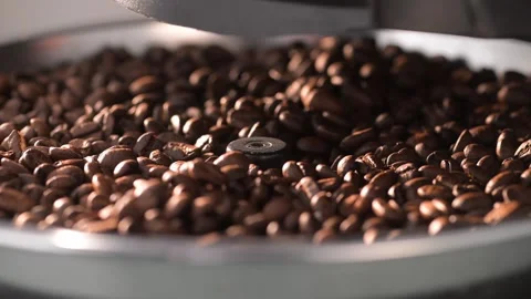 Slow Motion: Agitating Freshly Roasted Coffee Beans in Cooling Tray Stock Footage 247660789