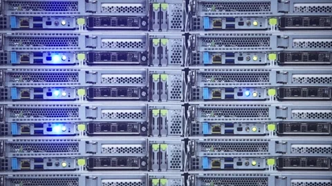 Slow motion of AI server racks blinking with blue LED lights in a dark room Stock Footage 331288047