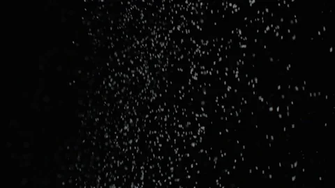 Slow motion air particle practical effect on black Stock Footage 107993615