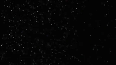 Slow motion air particle practical effect on black Stock Footage 107995811