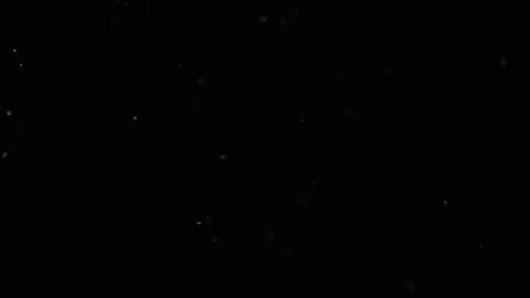 Slow motion air particle practical effect on black Stock Footage 107996950