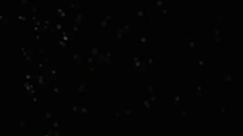 Slow motion air particle practical effect on black Stock Footage 107997349