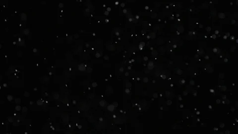 Slow motion air particle practical effect on black Stock Footage 107997445