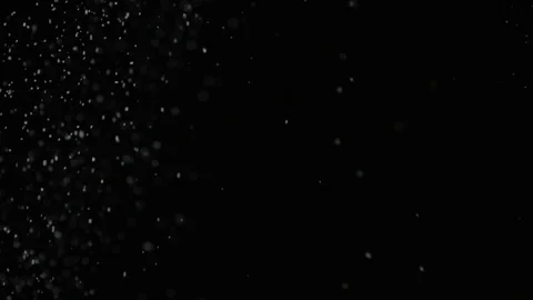 Slow motion air particle practical effect on black Stock Footage 107999714
