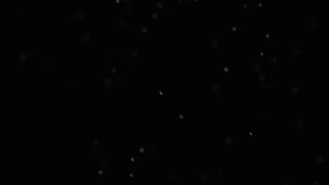 Slow motion air particle practical effect on black Stock Footage 107999863