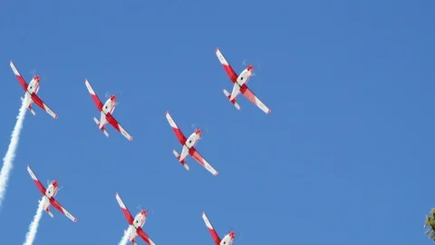 Slow motion of airplanes making formation in sky of swiss air force team Stock Footage 129094178