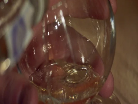 Slow Motion Alcohol being poured in Glass Stock Footage