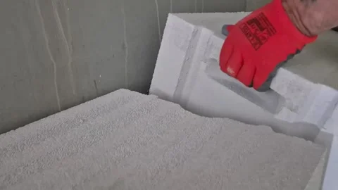 Slow Motion Aligning Ytong Block with Rubber Mallet 库存影片 333043393