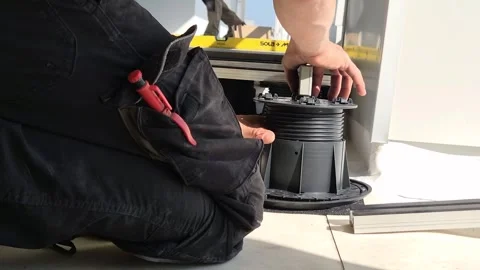 Slow Motion Alignment of Rooftop Floor Pedestals in Budapest Stock Footage 333043159