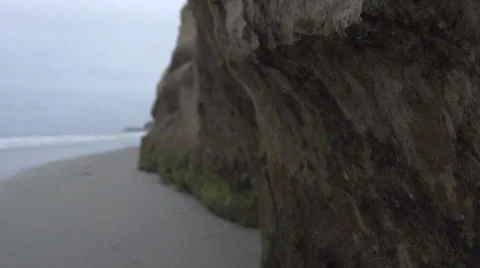 Slow Motion Along Side of Cliff HD Video Stock Footage 24632071