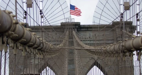 Slow Motion American Flag Waving In Wind On Impressive Iconic Brooklyn Bridge Stock Footage 112774081