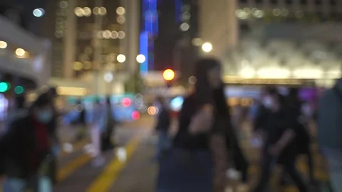 Slow motion and blurred many people walking on cross the road at night Stock Footage 245486442