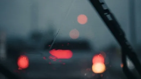 Slow motion and defocused of rain drops on windshield. Video stock 92459538