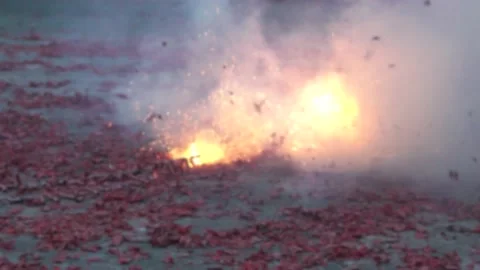 Slow motion and defocused shot Procession traditional red firecrackers explode Stock Footage 167886483