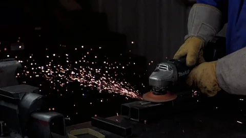 Slow Motion Angle Grinder in Action Stock Footage 73153058