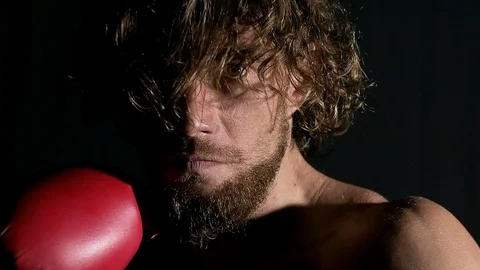 Slow motion of angry boxer in front of camera. Stock Footage 92204869