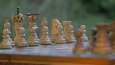 Slow motion Angry hitting the chessboard. Chess pieces are flying in the air Stock-Footage 118746549