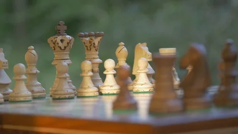 Slow motion Angry hitting the chessboard. Chess pieces are flying in the air Stock Footage 118747231