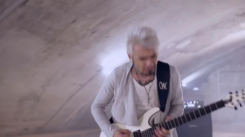 Slow motion angry rocker Stock Footage 75154558