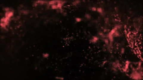 Slow motion animation of glowing particles on a gradient red background. Stock Footage 249257817
