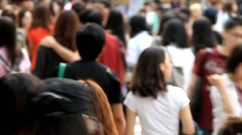 Slow motion of Anonymous crowds on downtown street Stock Footage 11133557