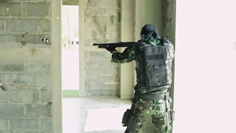 Slow motion of anti terrorist training in building. Stock Footage 92313484