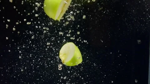 Slow motion of apple fruit in water Stock-Footage 243714088