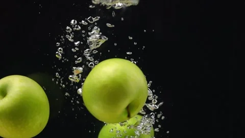 Slow motion of apple fruit in water 動画素材 243714119