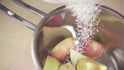 Slow motion apple slices covered with sugar Stock Footage 88401685