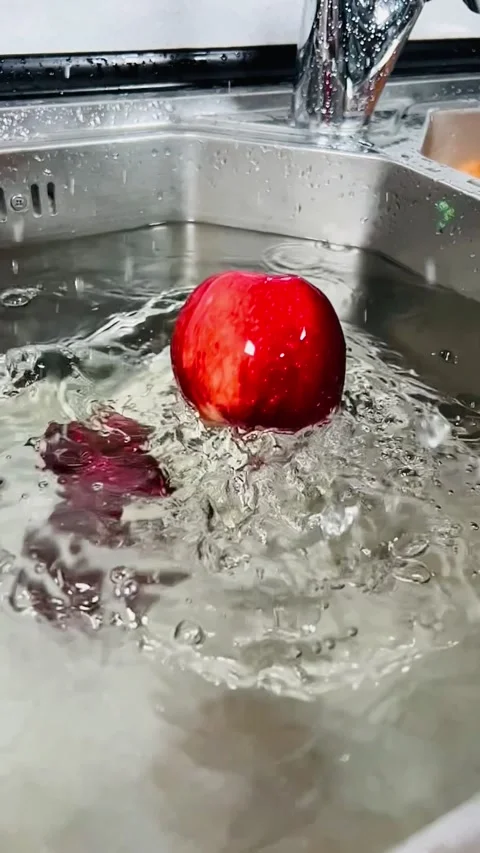 Slow motion apple splash, 9:16 vertical footage Stock Footage 337727361