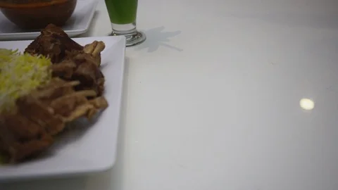 Slow-motion of Arabic ouzi lamb rice Stock Footage 129928056