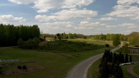 Slow motion ariel view of the Botanical Garden of Vilnius University Stock Footage 108106314