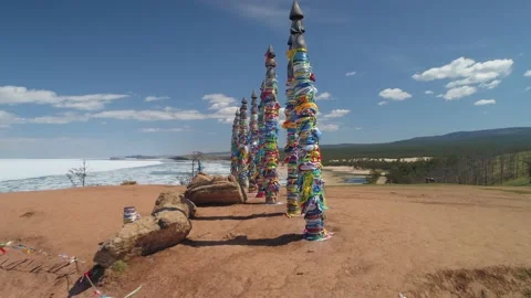 Slow motion around Serge pillars Spring Lake Baikal Ritual place Burkhan Olkhon  Video stock 202644211