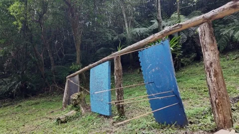 Slow Motion Arrow Hitting Hanging Target in Mid Air Close Up Shot Stock Footage 340414068