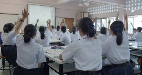 Slow motion of Asian high school students in white uniform actively study scienc Stock Footage